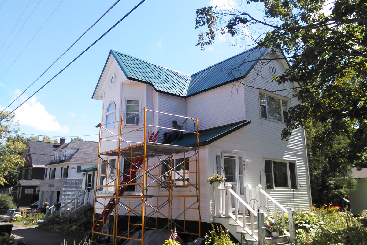 metal roof on 2 story house